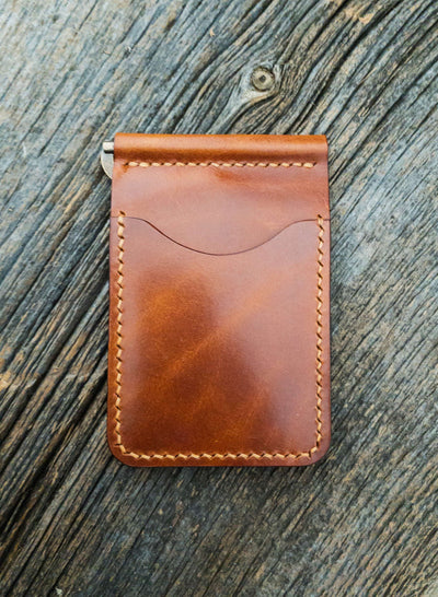 Folding Clip Wallet in Buck Brown full grain traditional harness leather, pockets hand stitched with Ritza Tiger thread in Tan, and brass spring clip